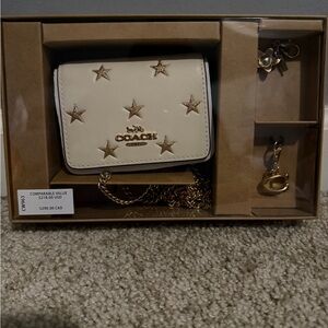 Coach Cream Crossbody Bag with Gold Stars
